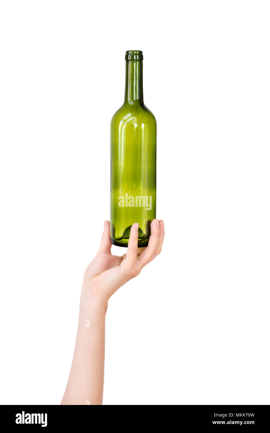 Female hand holding empty glass bottle isolated on white. Recyclable