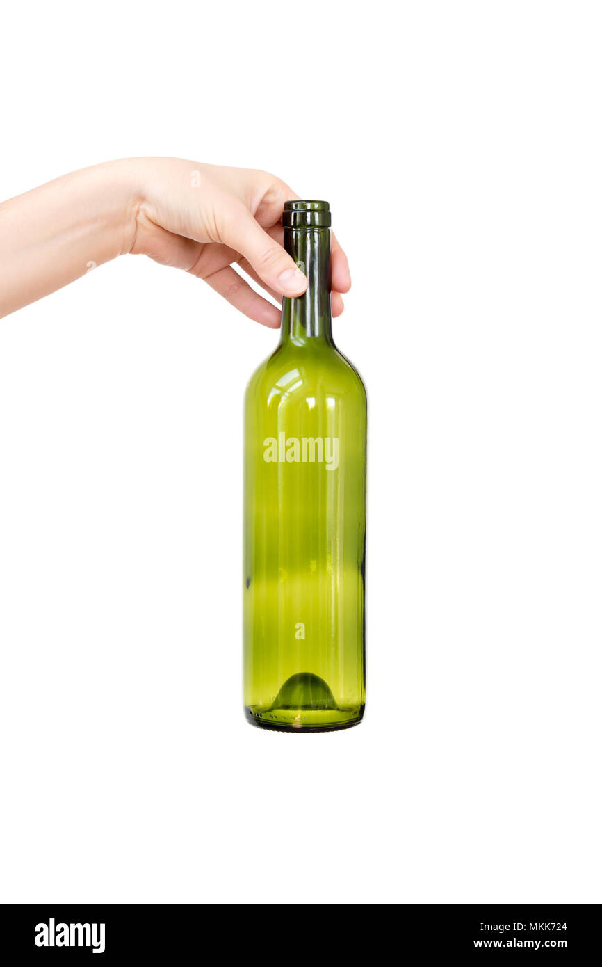 Female hand holding empty glass bottle isolated on white. Recyclable