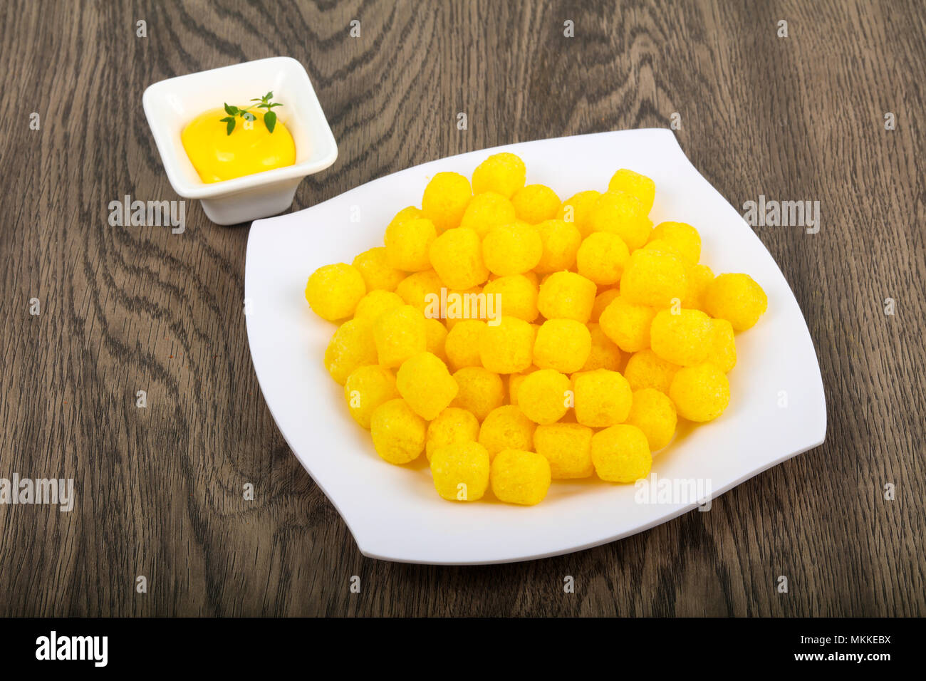 Cheese corn balls with sauce Stock Photo Alamy