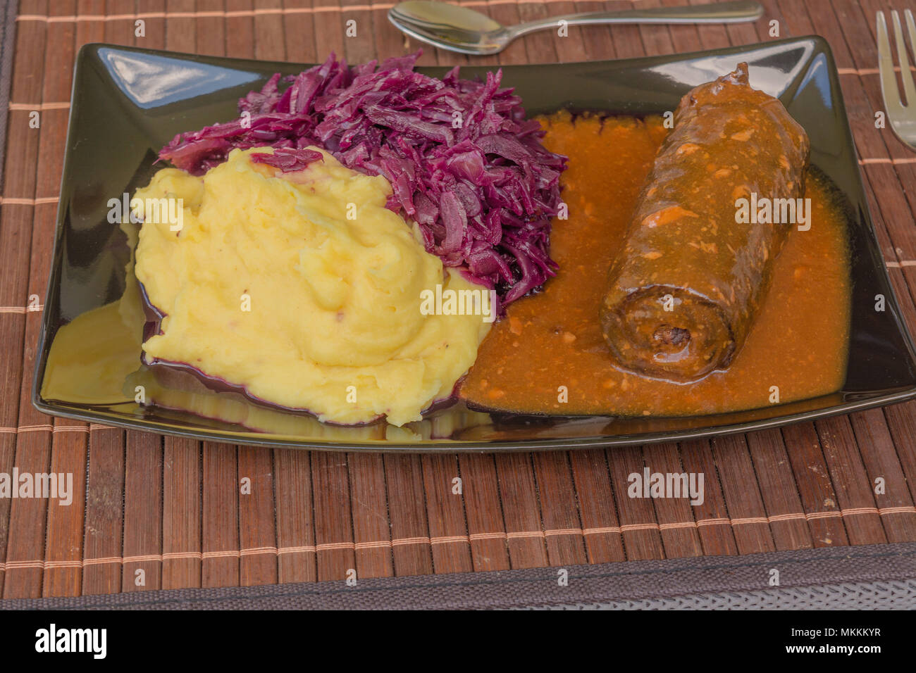 Beef roulade with red cabbage and mashed potatoes Stock Photo Alamy