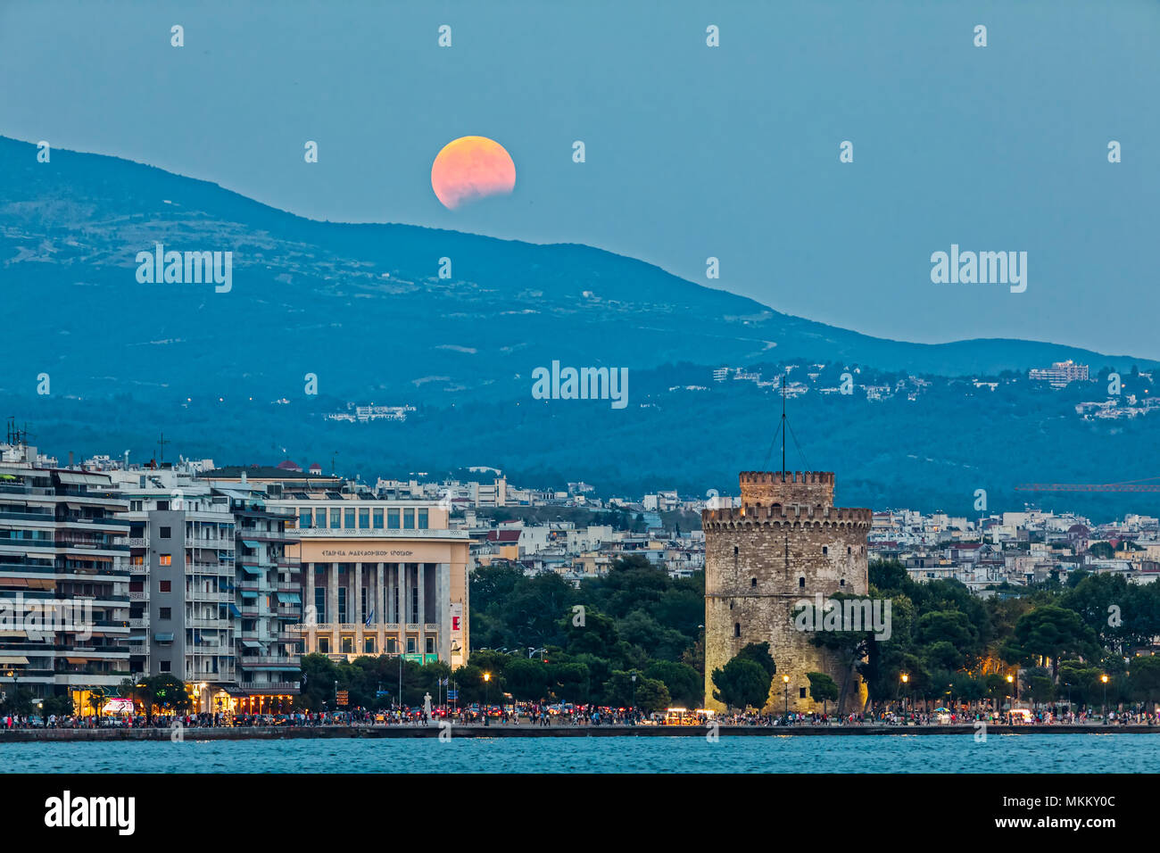 Thessaloniki, Greece -  August 7, 2017: Full Blood Moon and Eclipse Oven White Tower of Thessaloniki, Greece Stock Photo