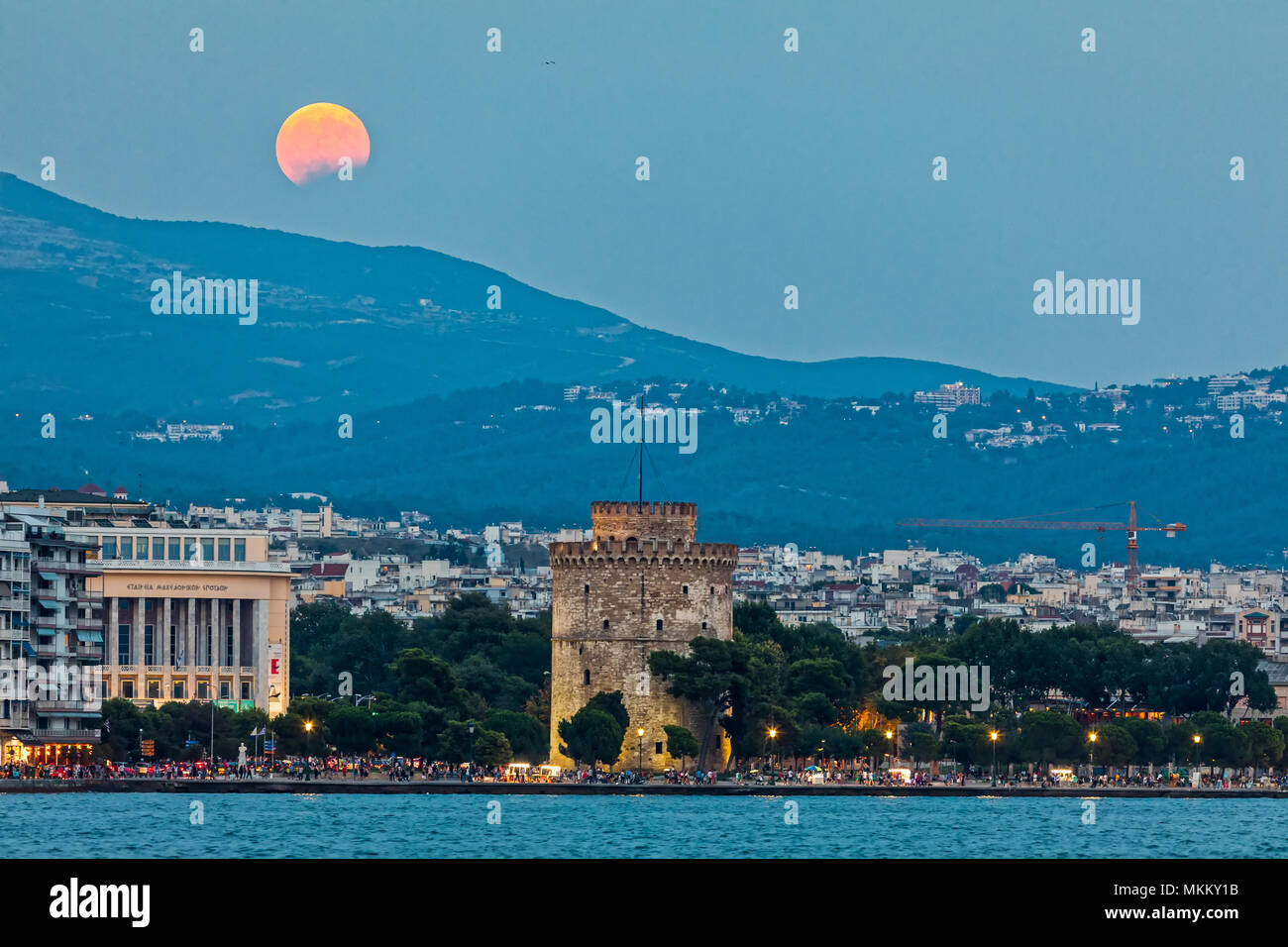 Thessaloniki, Greece -  August 7, 2017: Full Blood Moon and Eclipse Oven White Tower of Thessaloniki, Greece Stock Photo