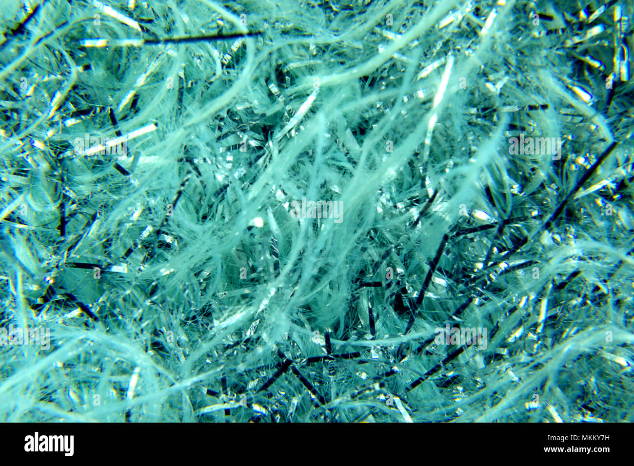 image abstract background of shiny blue and white tinsel and glitter Stock Photo
