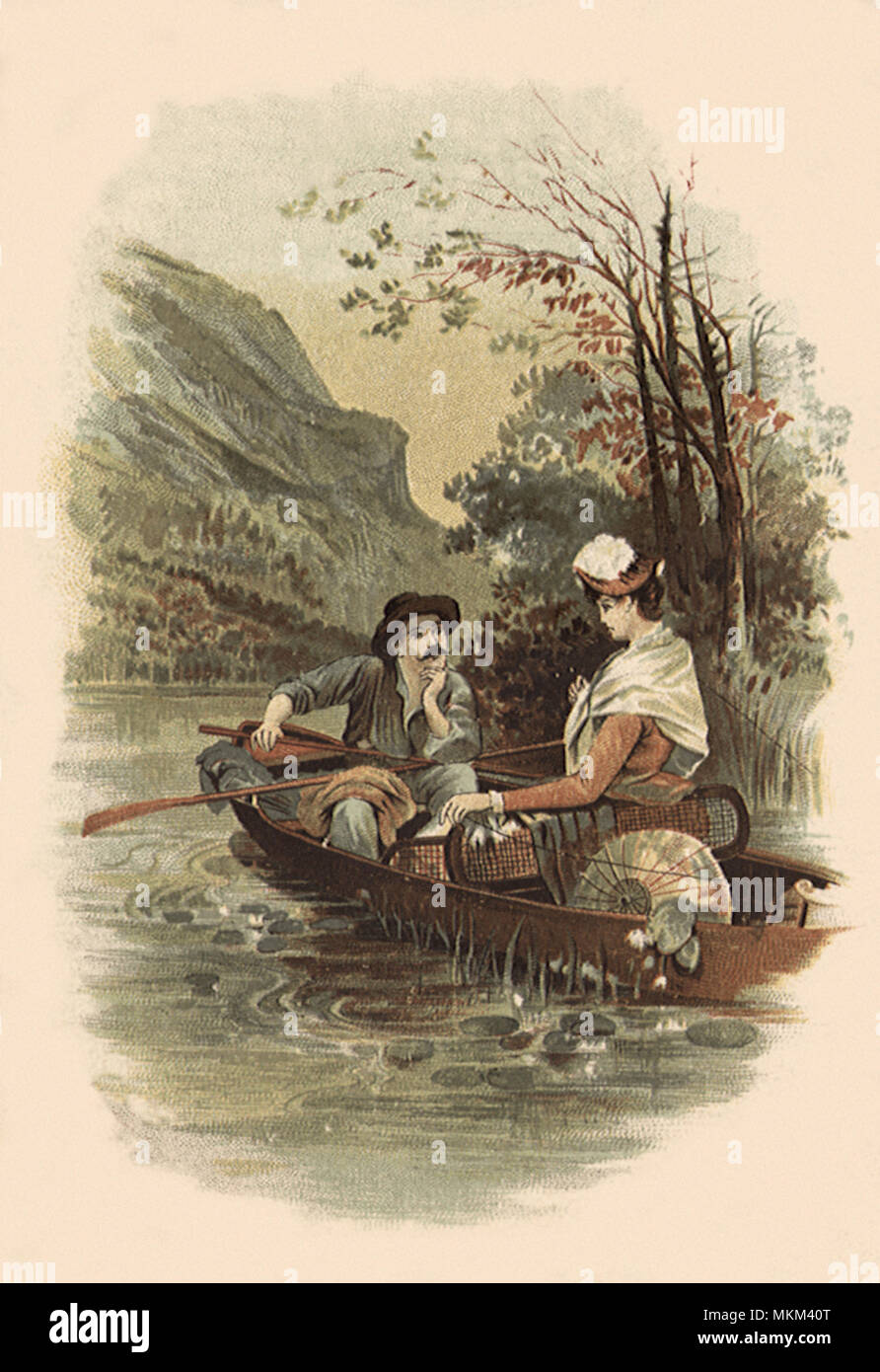 Couple in Rowboat Stock Photo