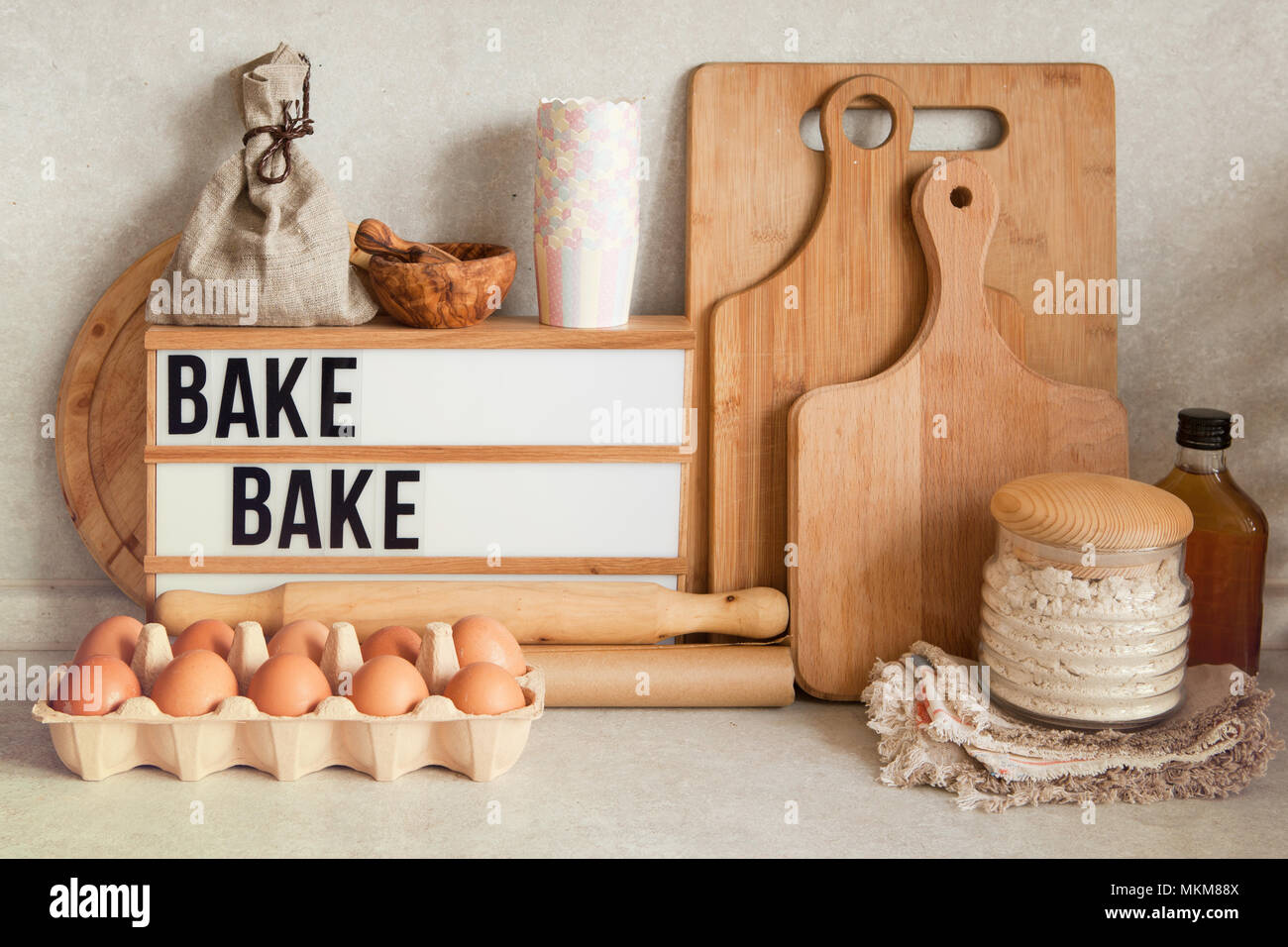 Baking or cooking ingredients, kitchen items for baking cakes. Kitchen  utensils, flour, eggs, almond, cinnamon, butter, sugar, rum. Pastry making  and Stock Photo - Alamy