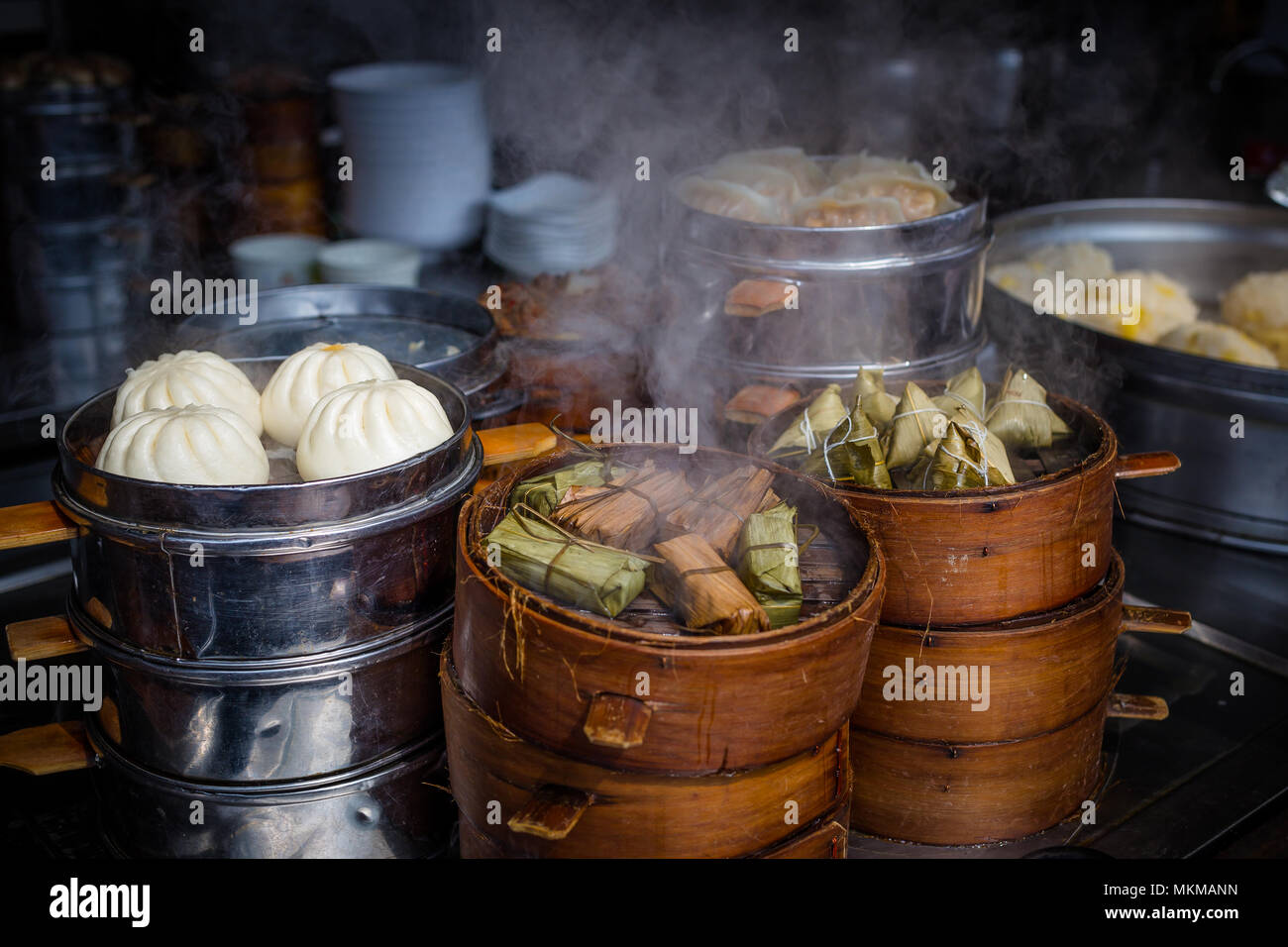 Street food booth selling chinese specialty steamed dumplings in china Stock Photo