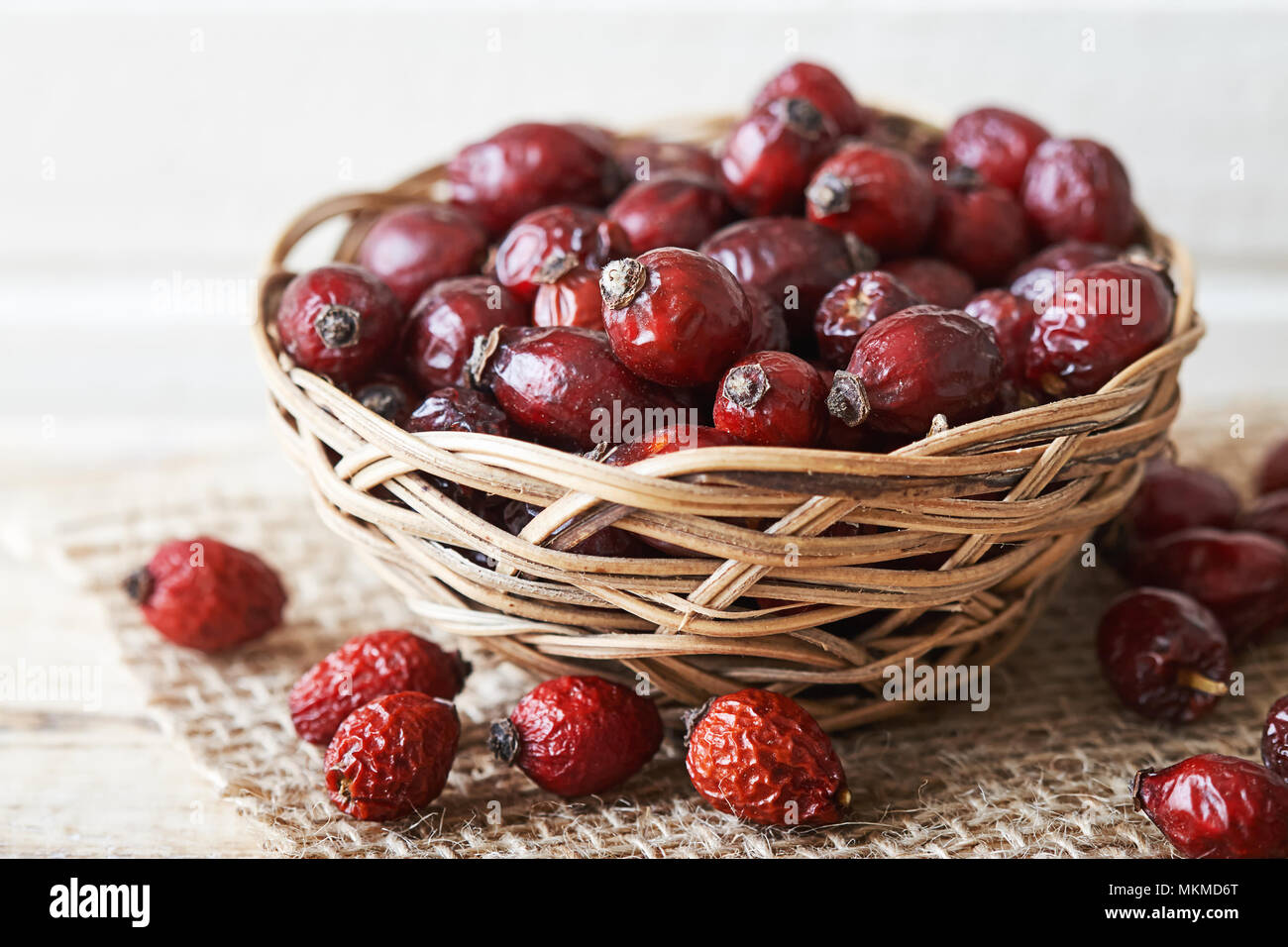 Dried dog rose fruit (Rosa canina) in woven basket Stock Photo Alamy
