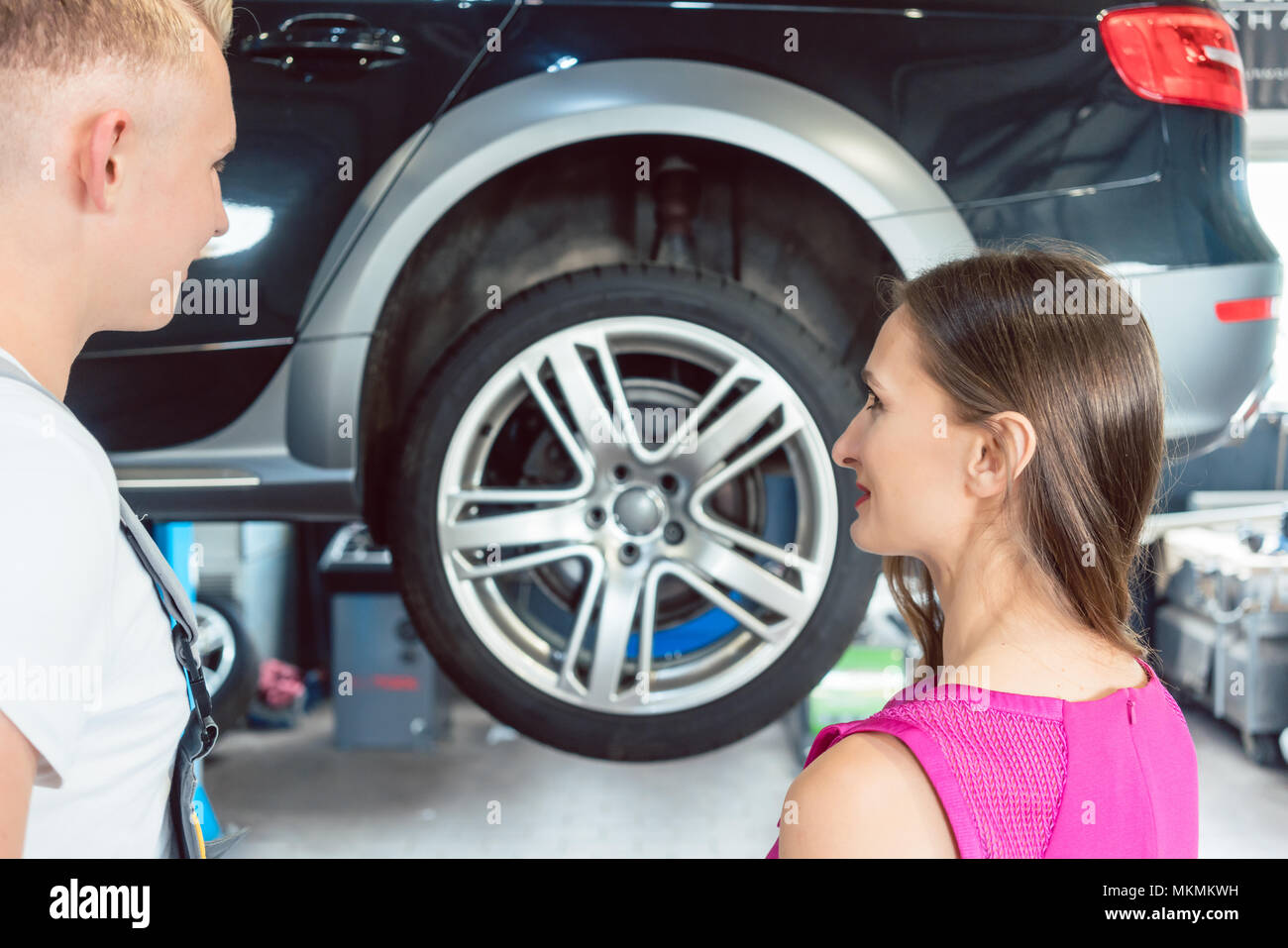 Reliable Auto Mechanics >> Beautiful Woman Looking Happy At A Reliable Auto Mechanic Reliable Auto Mechanics >> Beautiful Woman Looking Happy At A Reliable Auto Mechanic