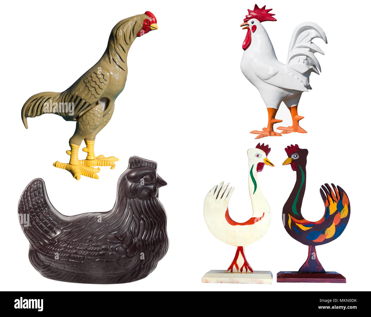 Four different chickens background: chocolate hen, wind-up rooster, rooster and Swedish folk art pair. Stock Photo