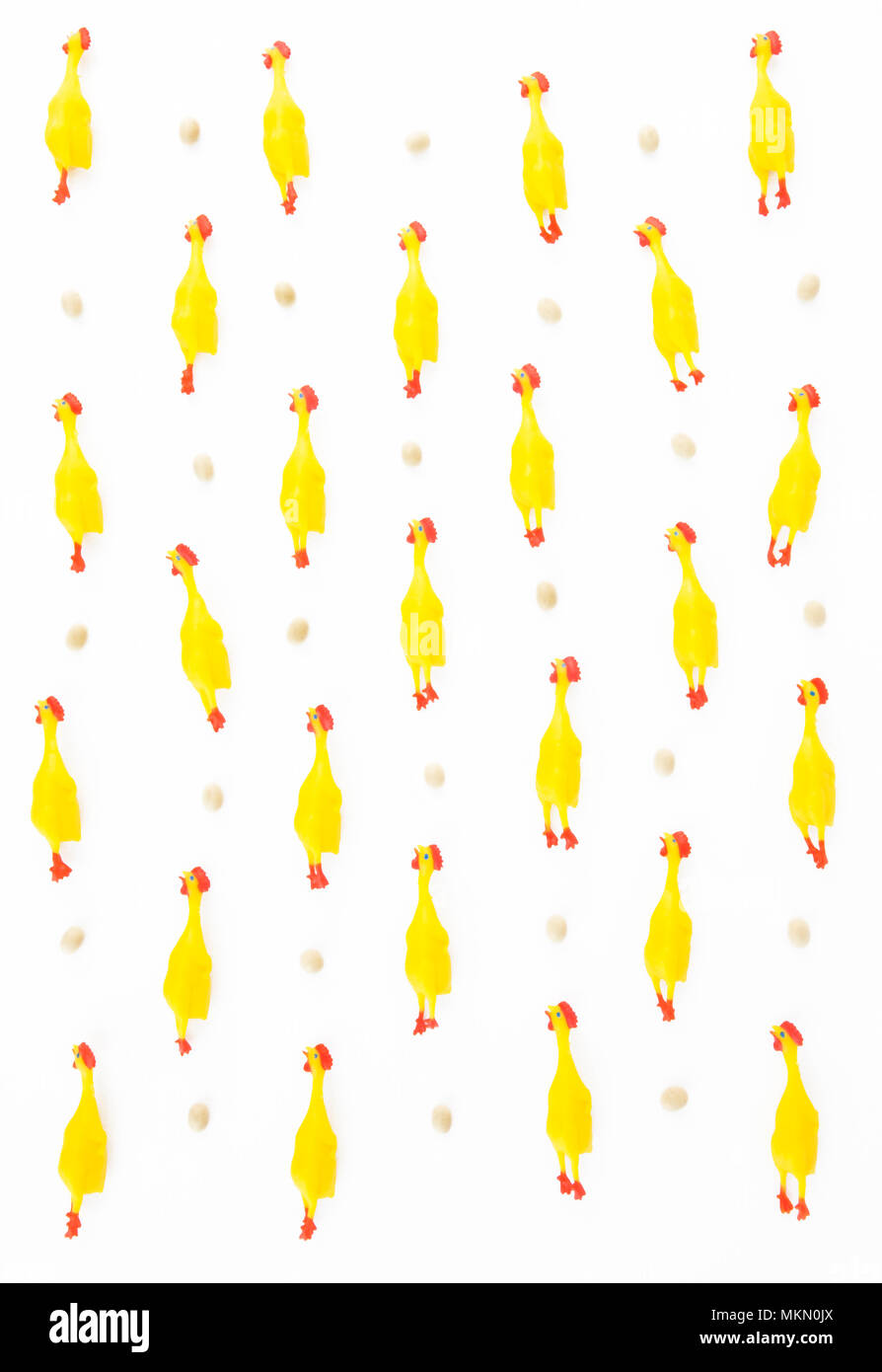 Tiny rubber chicken background Stock Photo Alamy