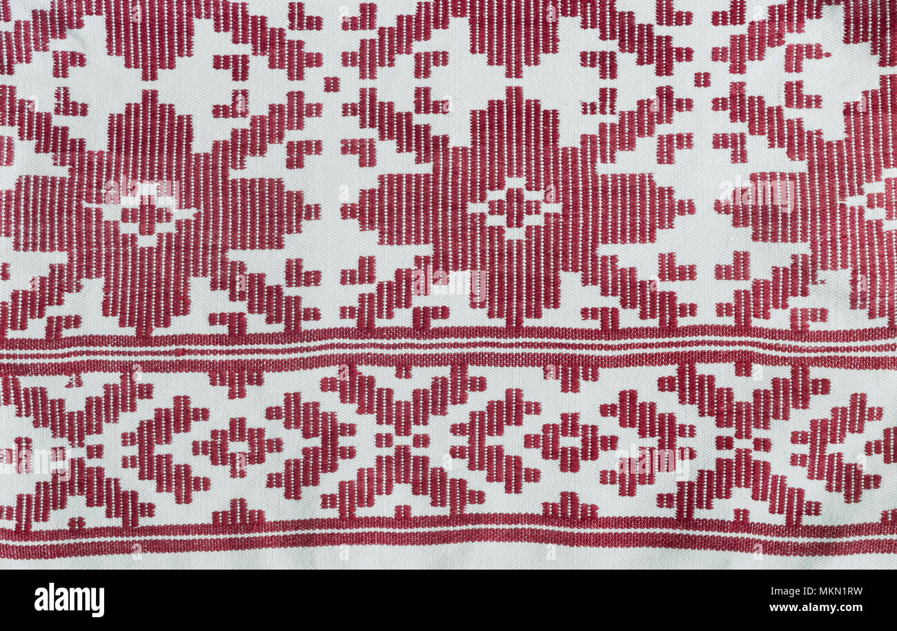 A fragment of ancient fabric with a beautiful pattern, made on a ...
