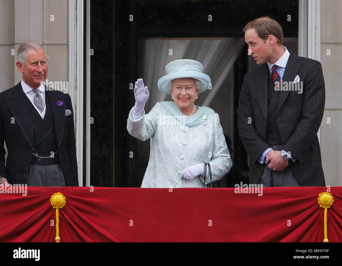 Queen Elizabeth II with the future kings - Prince Charles (now King Charles III) and Prince William (now Prince of Wales) on the balcony of Buckingham Palace to commemorate the 60th anniversary of the accession of the Queen, London. 5 June 2012 --- Image by © Paul Cunningham Stock Photo