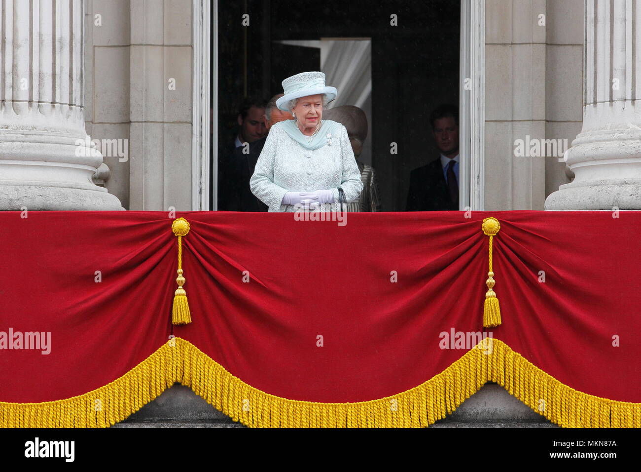 Queen Elizabeth II with future kings - Prince Charles and Prince  William on the balcony of Buckingham Palace to commemorate the 60th anniversary of the accession of the Queen, London. 5 June 2012 --- Image by © Paul Cunningham Stock Photo