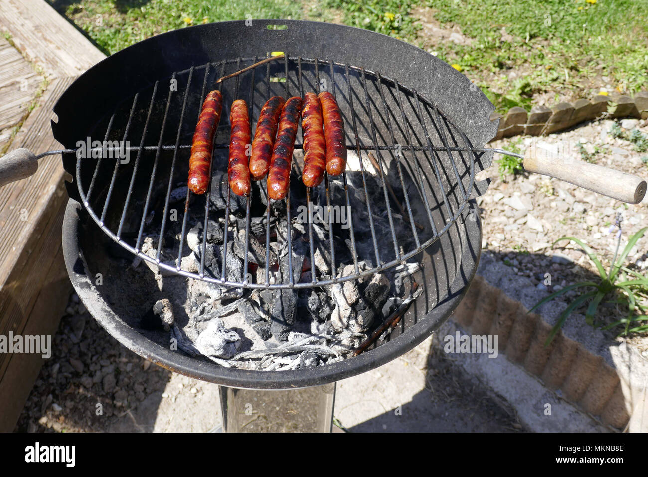 Cooking on barbecue grill hi-res stock photography and images - Alamy