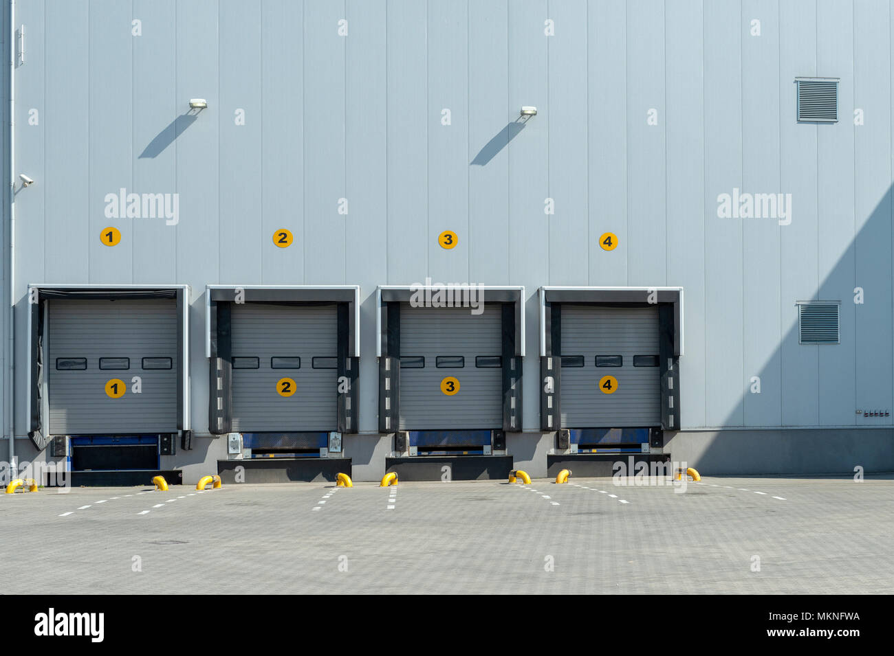 Loading docks with shutter doors at a warehouse Stock Photo