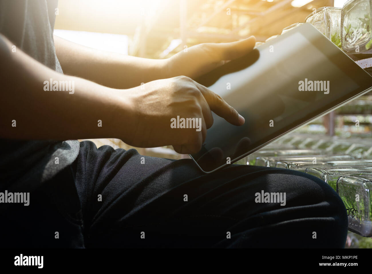 hand tablet  man working using a digital tablet  laptop computer Stock Photo