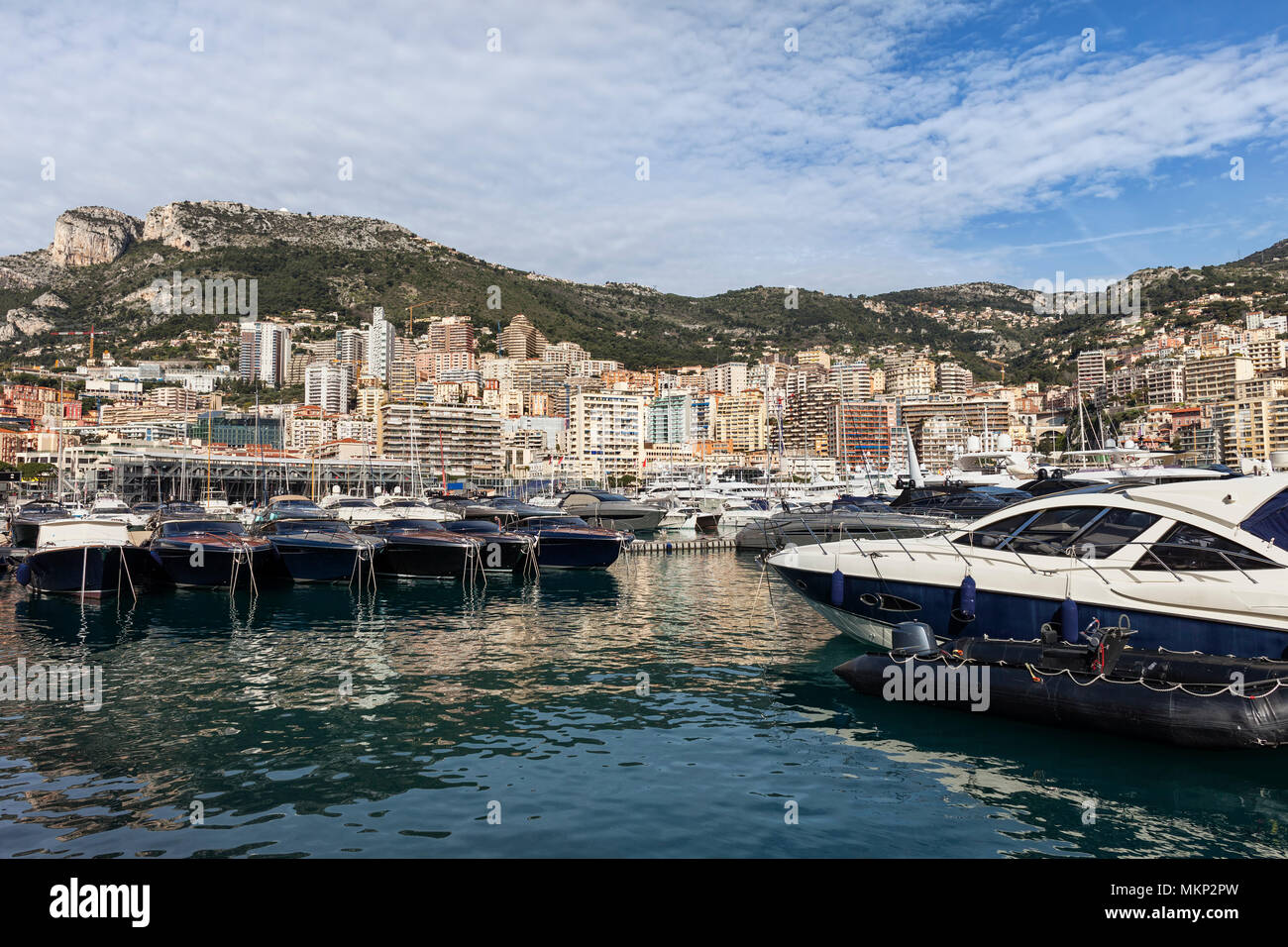 Monaco principality, city skyline and yachts in Port Hercules on Mediterranean Sea Stock Photo