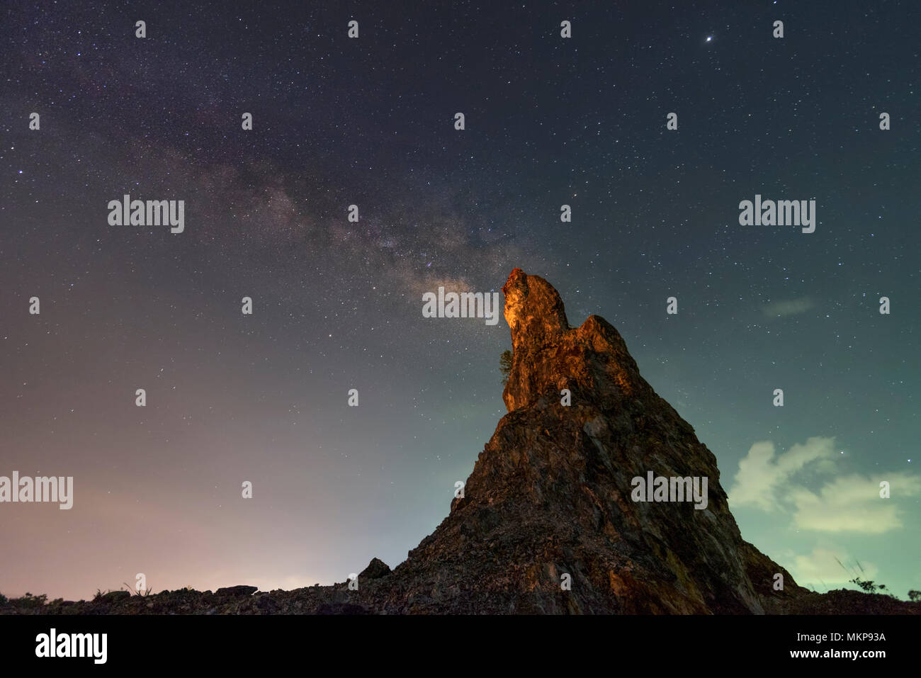 Milky way over the Rock Mountain Stock Photo