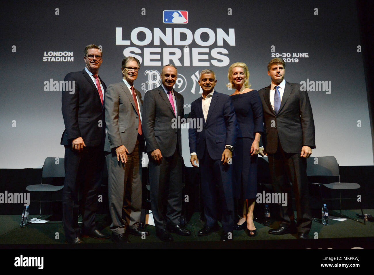 (Left to right) Chief of Business Affairs for the MLBPA Tim Slavin, Boston Red Sox joint owner John W Henry, MLB Commissioner Rob Manfred, Mayor of London Sadiq Khan, New York Yankees joint owners Jennifer Steinbrenner Swindal and Hal Steinbrenner during the press conference at Regent Street Cinema, London. Stock Photo