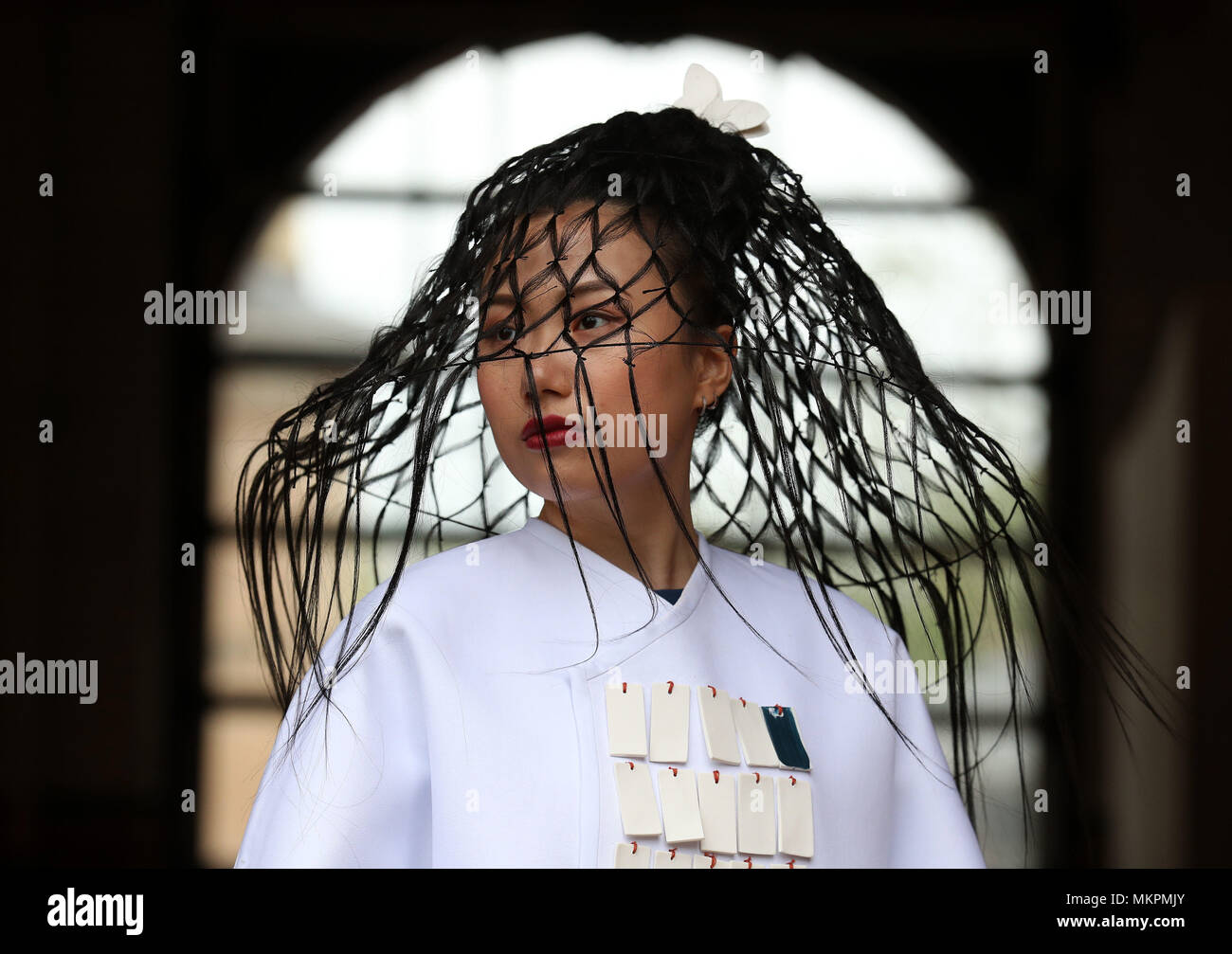 Student Nuoya Chen wears a costume designed by Harriet Ogden during the ...
