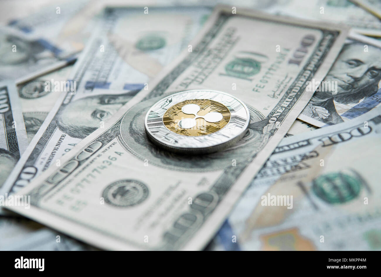 Crypto currency ripple xrp and us dollars money background. Blockchain and  cyber currency. Global money. Exchange, bussiness, commercial. Cash money  and cryptocurrency concept Stock Photo - Alamy