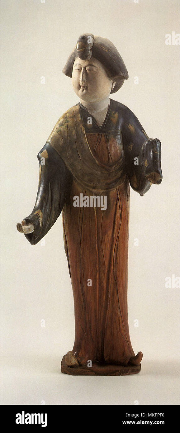 Statuette of a Standing Woman Stock Photo