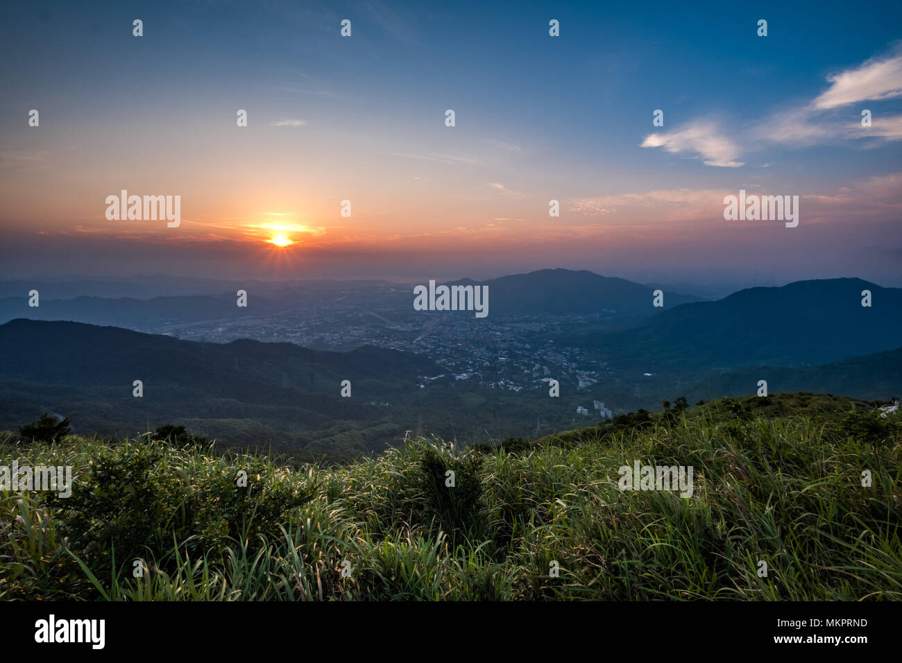 Montains sunset at Hong Kong Stock Photo - Alamy
