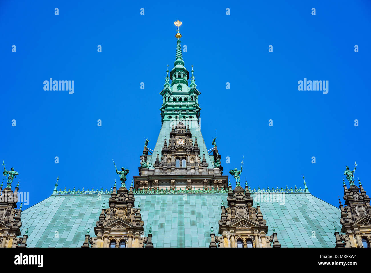 Decorated emerald colored roof and facade of the beautiful famous Rathaus Hamburg town hall in Altstadt quarter, Hamburg, Germany Stock Photo