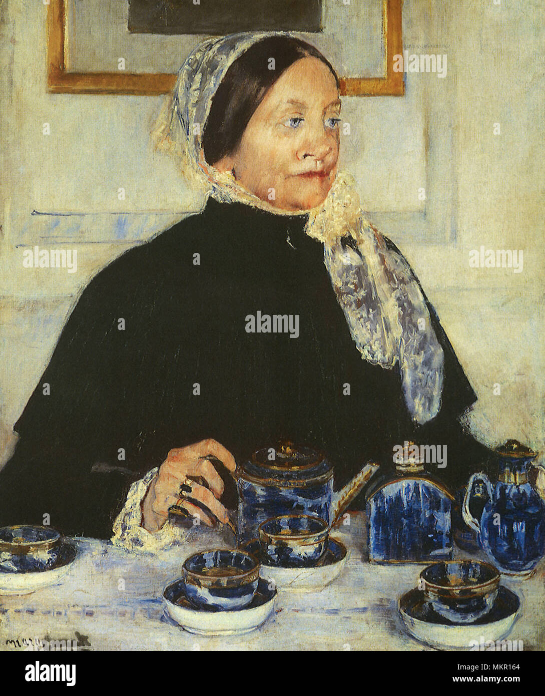 Lady at the Tea Table Stock Photo