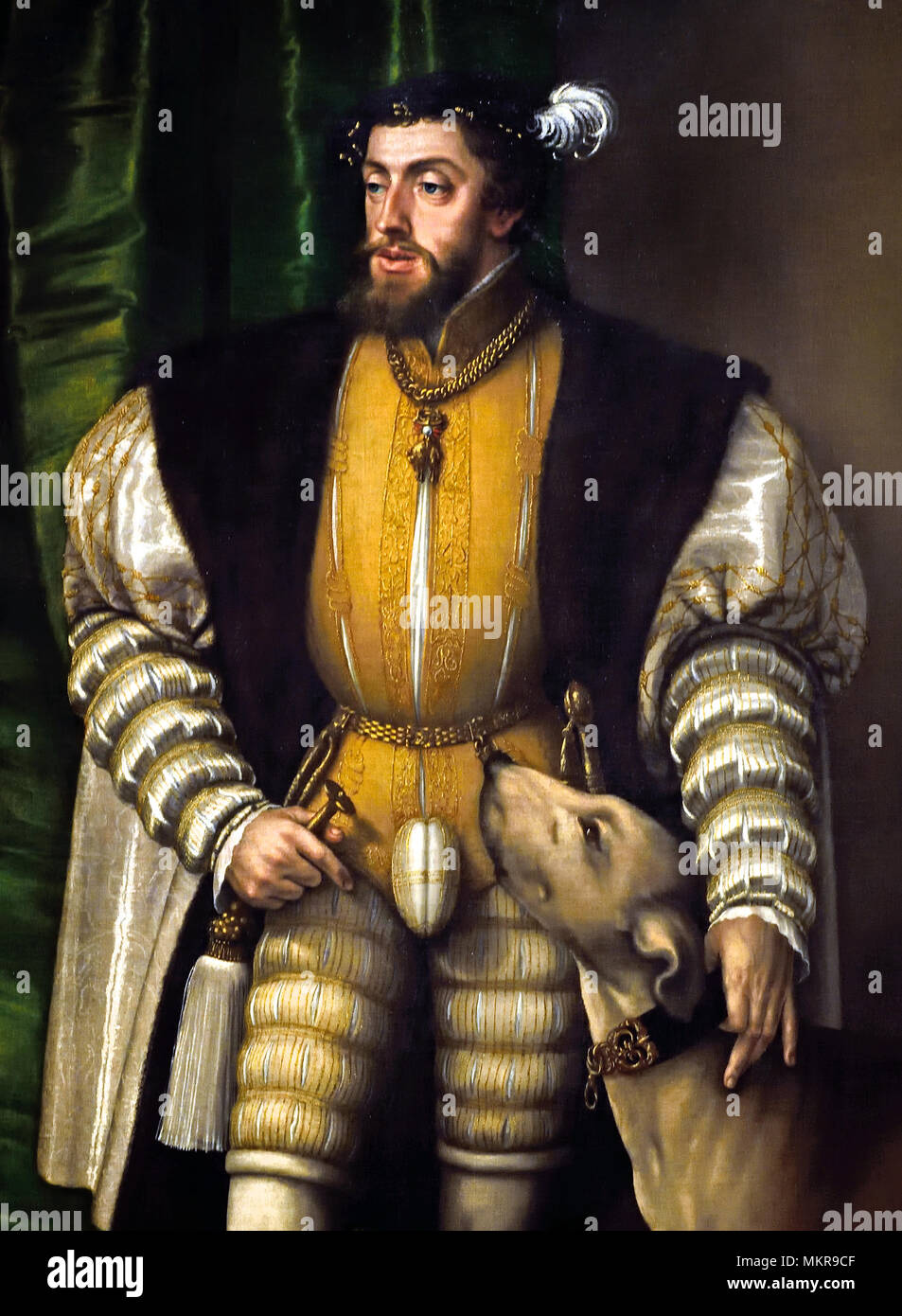 Charles V, Holy Roman Emperor  (with his English water dog), 1532.by Jakob Seisenegger (1504/5 - 1567) Austrian Austria, 16th Century, ( Charles V was ruler of both the Spanish Empire from 1516 and the Holy Roman Empire from 1519, as well as of the lands of the former Duchy of Burgundy from 1506 ) Stock Photo