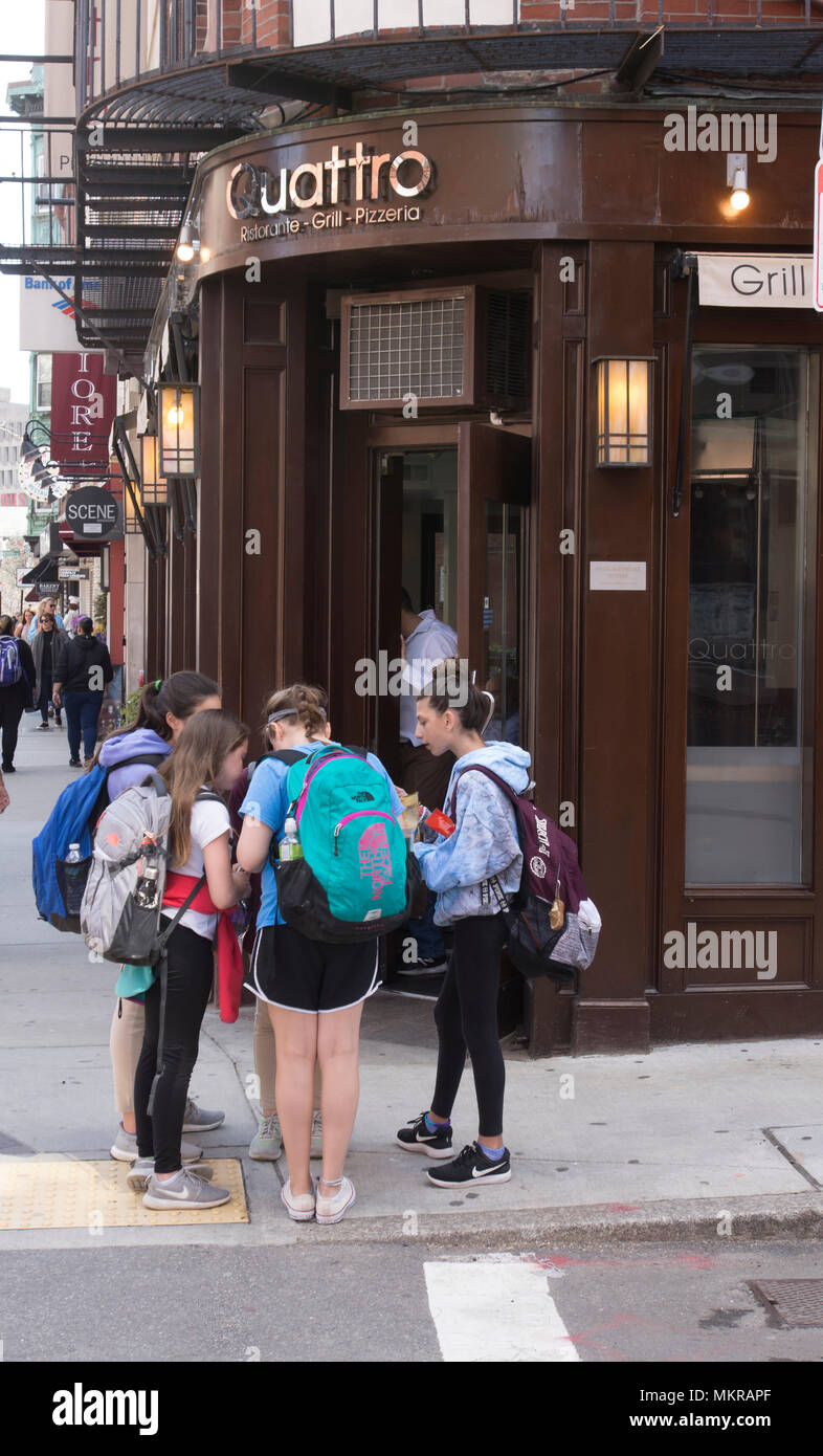 A group of students exploring the North End of Boston, Massachusetts, USA Stock Photo