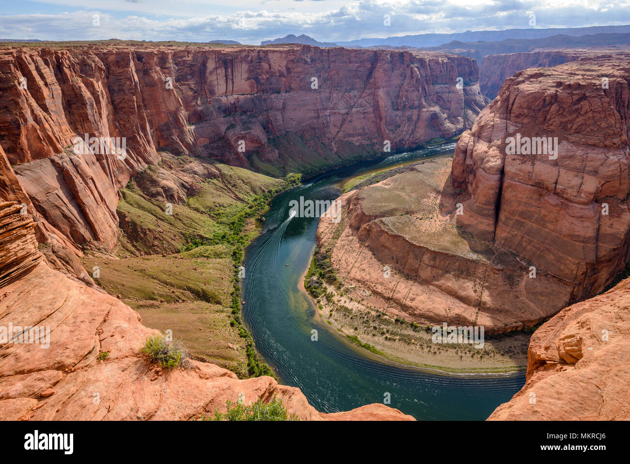 Horseshoe Bend - Overview of Colorado River at Horseshoe Bend on a cloudy spring evening. Page, Arizona, USA. Stock Photo