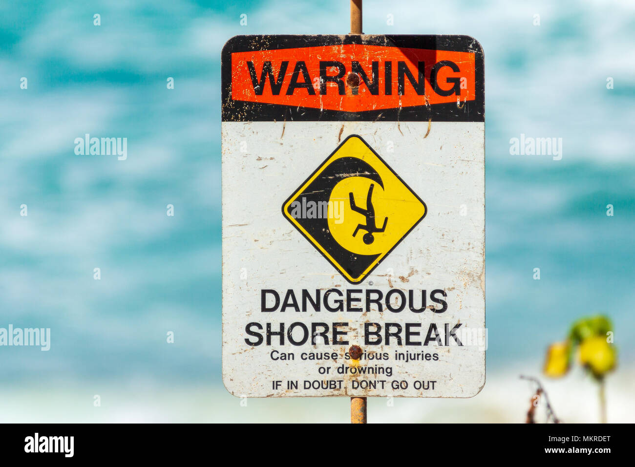 WARNING DANGEROUS SHORE BREAK sign Can cause serious injuries or drowning  IF IN DOUBT, DON'T GO OUT Stock Photo