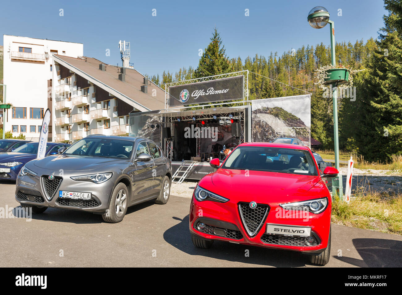 STRBSKE PLESO, SLOVAKIA - OCTOBER 01, 2017: Alfa Romeo advertising stand. It is Italian car manufacturer known for sporty vehicles, a subsidiary of Fi Stock Photo