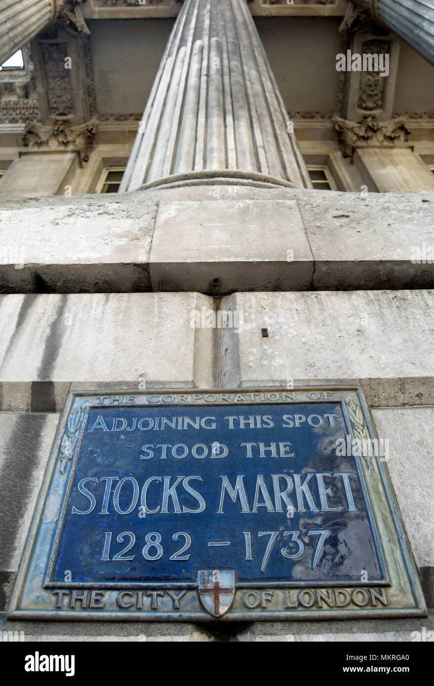 city of london blue plaque marking the site of the 1282 to 1737 stocks market, mounted on the exterior of what is now the mansion house Stock Photo