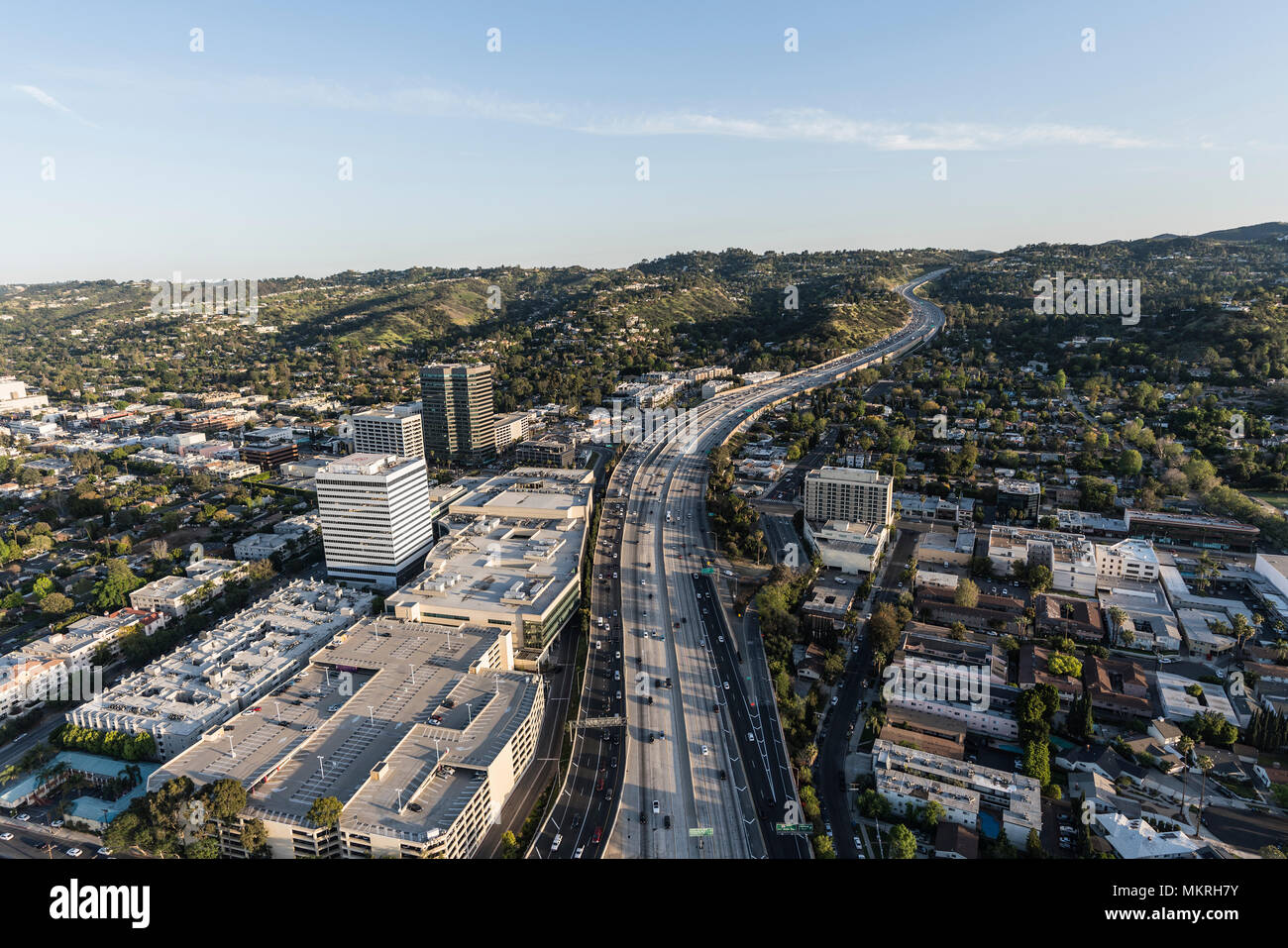 Late afternoon aerial view of San Diego 405 Freeway near Ventura Blvd in the San Fernando Valley area of Los Angeles, California. Stock Photo