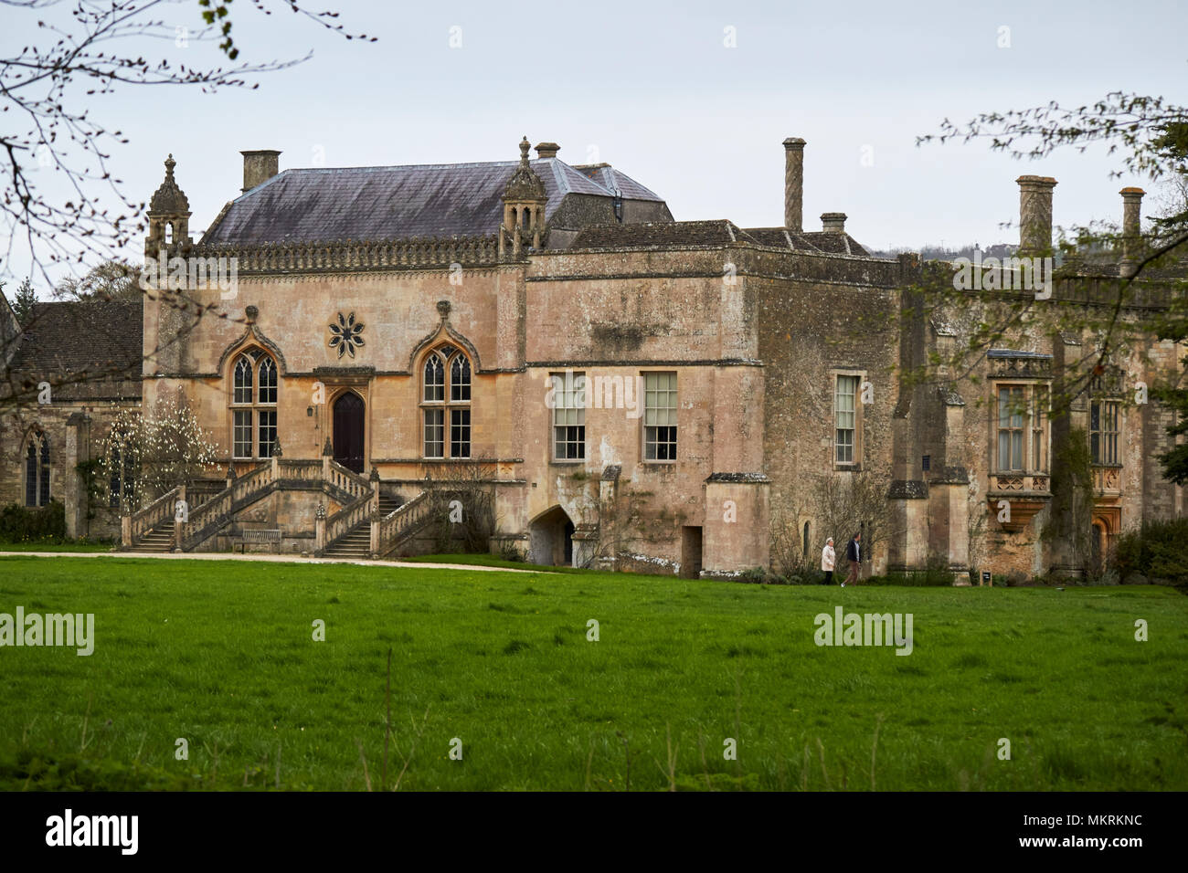 Lacock abbey shot from outside grounds Lacock village wiltshire england uk Stock Photo