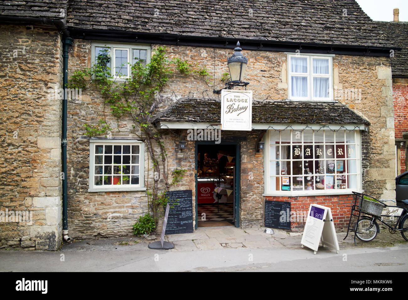 Lacock bakery in an old stone house in the village wiltshire england uk Stock Photo