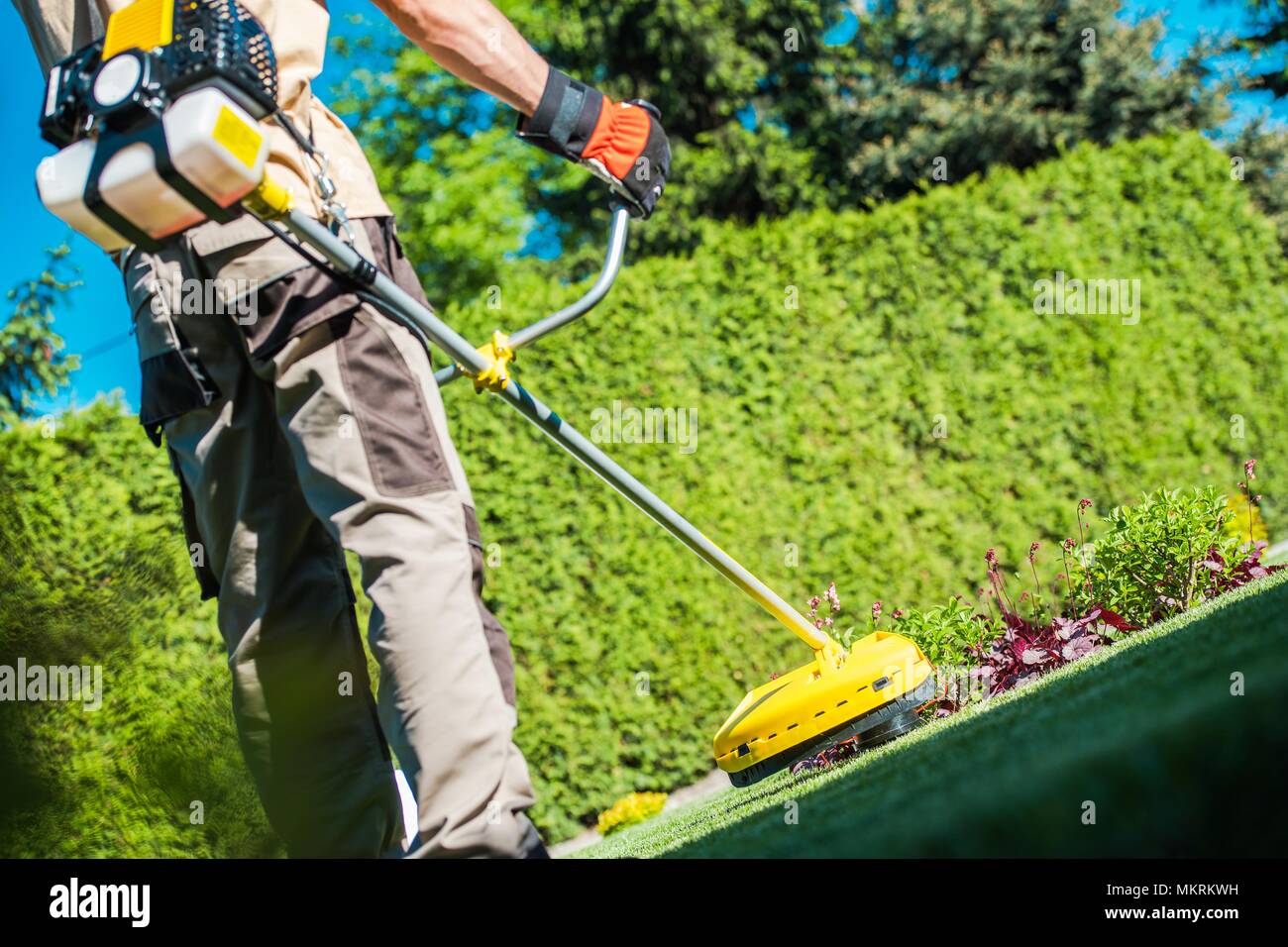 Gas string trimmer work hi res stock photography and images Alamy