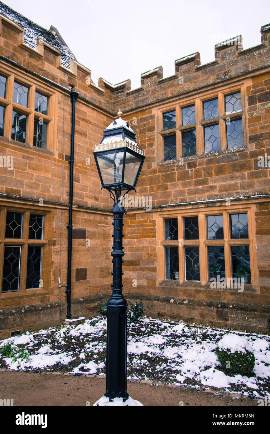 Delapre Abbey Northampton house stone lamppost lamp old style gas light snow freezing cold