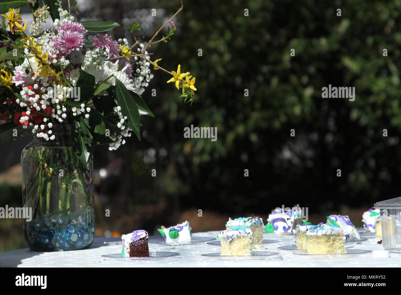 Cake and flowers during simple wedding Stock Photo
