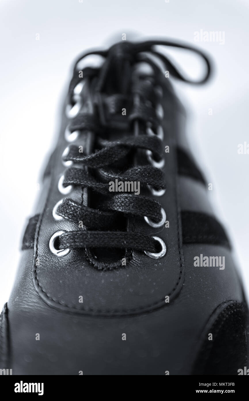 Macro shot of generic looking black shoe Stock Photo
