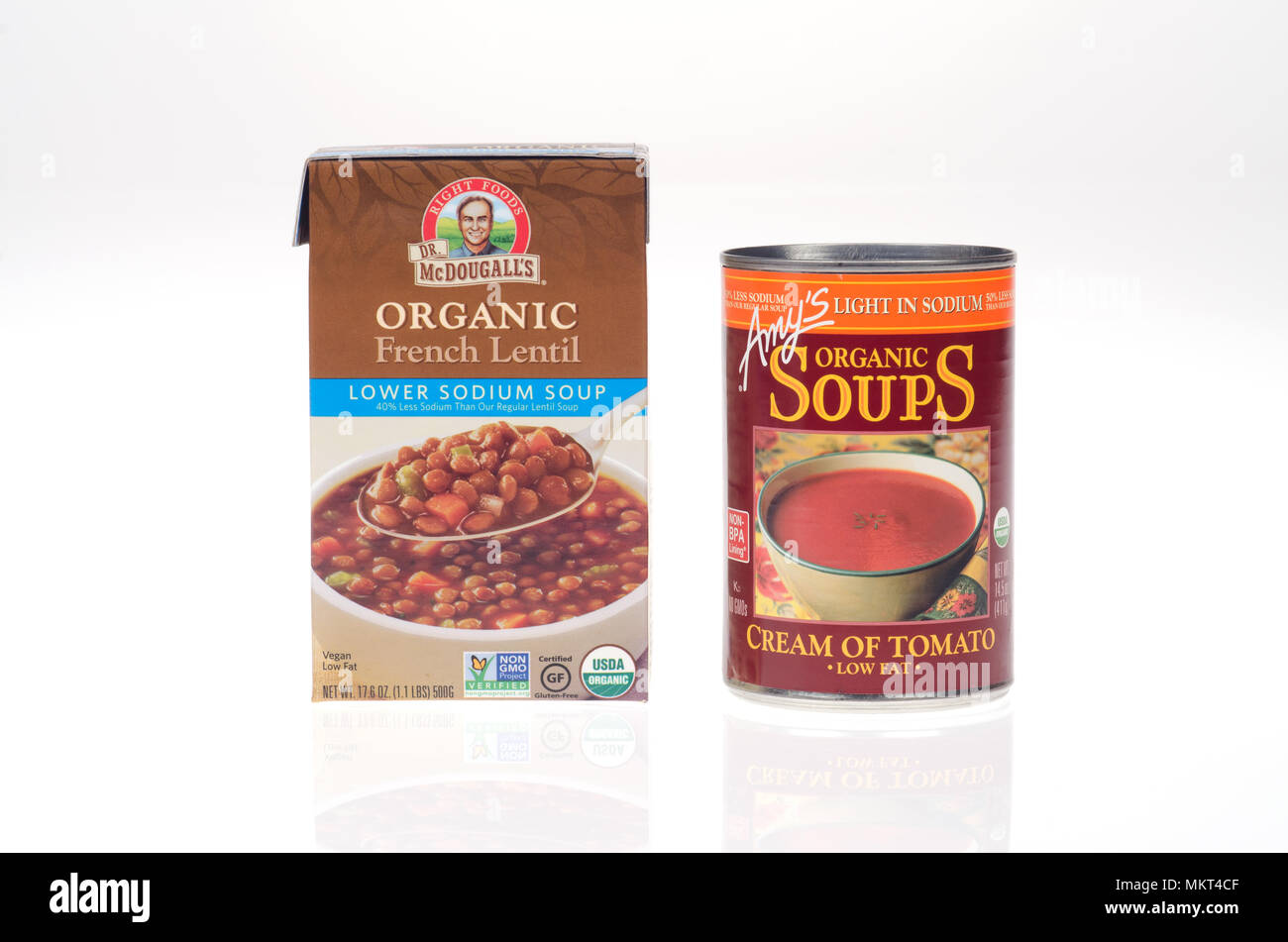 Organic lower sodium soup can and box of Amy’s Cream of Tomato and Dr. McDougall’s French Lentil Stock Photo