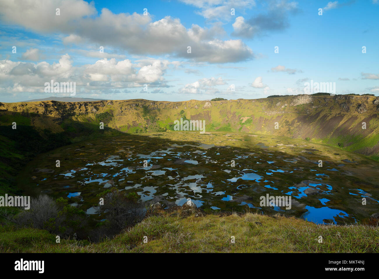 Lagoon in the crater of Rano Kau volcano at sunset, Easter island, Chile Stock Photo