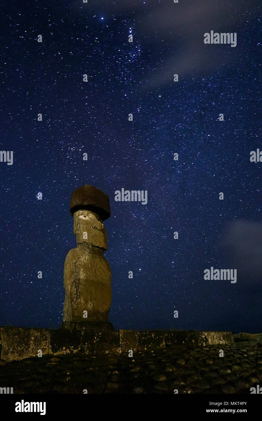 Moai on the restored Ahu Ko Te Riku in Centro Ceremonial Tahai in Hanga Roa under the stars, Easter island, Chile Stock Photo