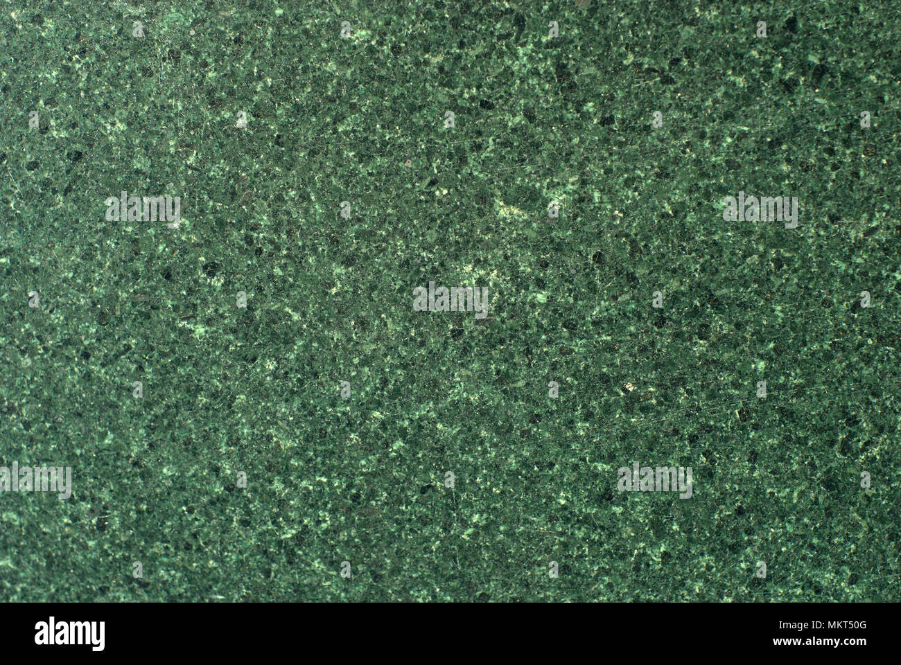 background, texture - polished serpentinite stone slab surface with