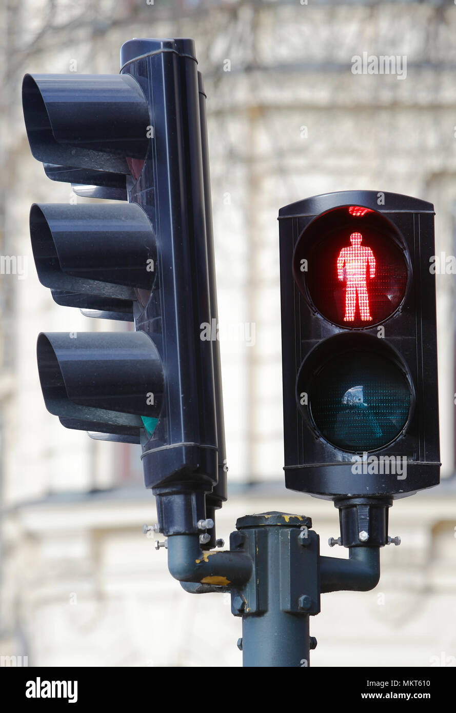 Traffic signal at the transition point showing stop for pedestrians. Stock Photo