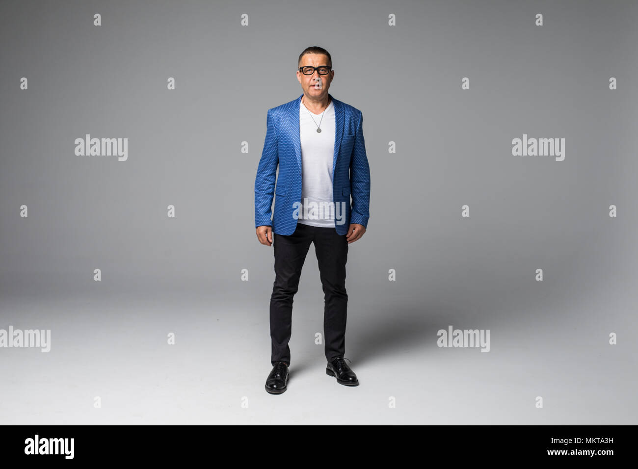 Full length portrait of confident mature businessman in formals ...