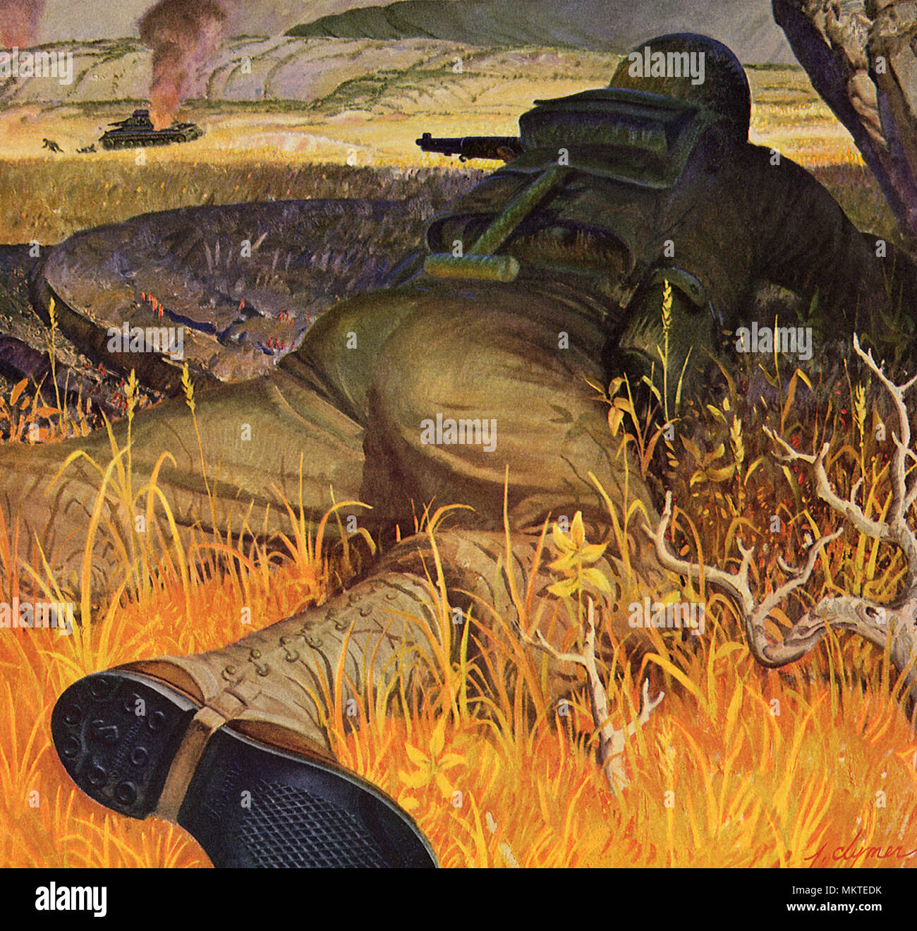 Soldier laying Prone attacking Enemy Tank Stock Photo