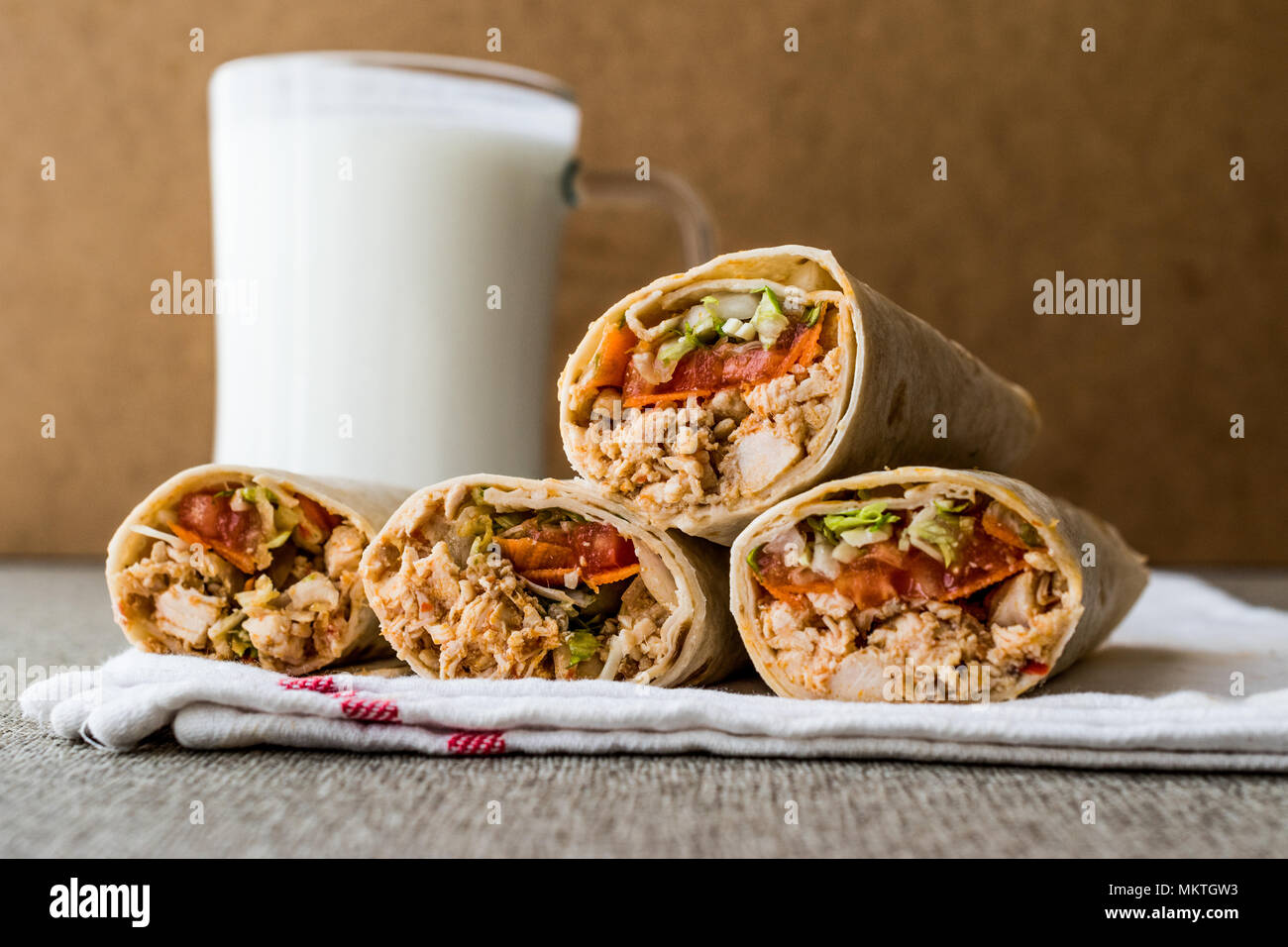 Chicken shawarma doner kebab with ayran or buttermilk. Fast food concept. Stock Photo